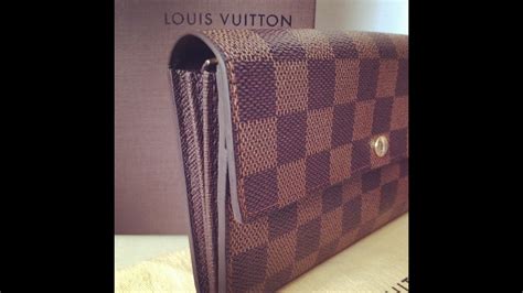 louis vuitton mens wallet repair